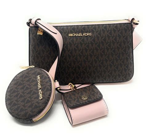 michael kors jet set s crossbody bag with tech attached|michael kors jet set item.